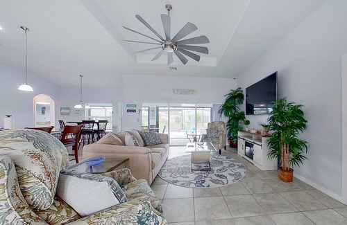 Trafalgar House | Waterfront home with private pool, dock, WiFi, central AC, and desk workspaces
