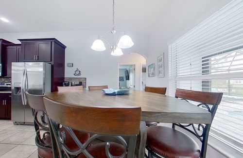 Trafalgar House | Waterfront home with private pool, dock, WiFi, central AC, and desk workspaces