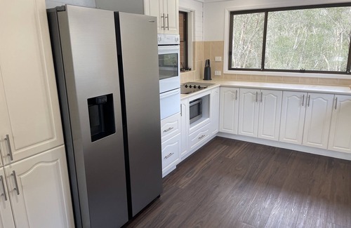 Dora Creek House | Waterfront Paradise with Jetty, Kayaks, BBQ, & more