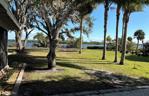 Palm City Cottage | Waterfront! Wide Views! Large Dock & Lift! 3/2 Cottage on Saint Lucie River