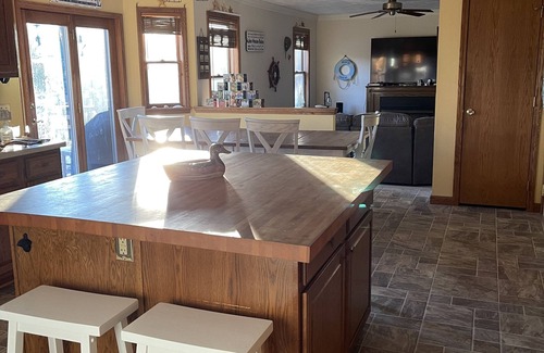 Treasure Lake House | Waterfront with dock on friendly private lake.