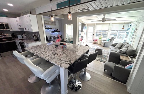 South Island House | WE ARE BACK! NEWER POOL/SPA and Walk to beach! Totally updated Canal front home!