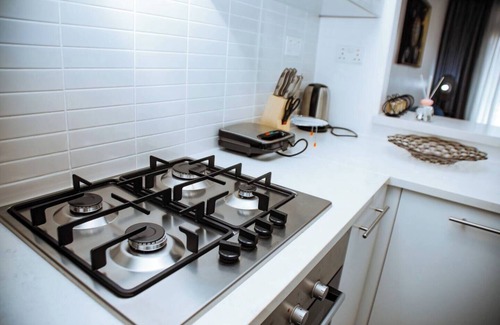 Patang West House | Welcome to our luxury gated townhome in Oyarifa Park, a serene enclave in Accra.