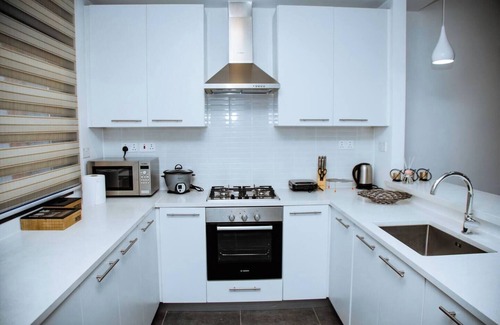 Patang West House | Welcome to our luxury gated townhome in Oyarifa Park, a serene enclave in Accra.