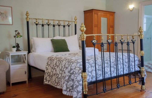 Golden Point House | Welcome to Rapunzel's Cottage, a charming 1-bedroom studio with a magical fairytale vibe