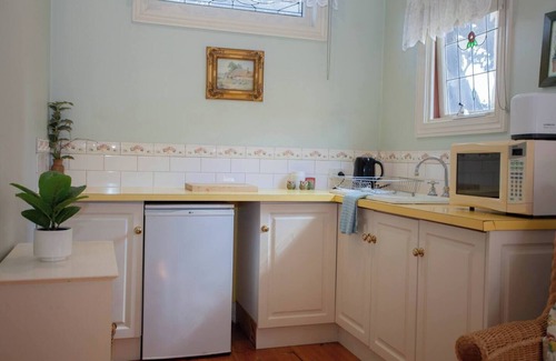 Golden Point House | Welcome to Rapunzel's Cottage, a charming 1-bedroom studio with a magical fairytale vibe
