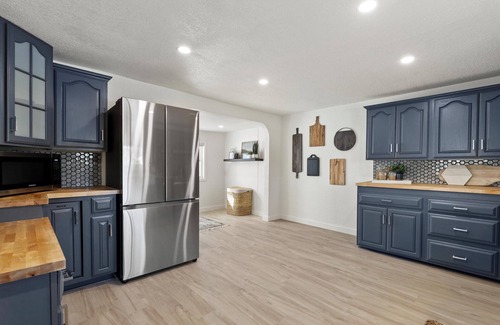 Village of Pewaukee House | Well Appointed Home Steps from Pewaukee Lake & Large Patio