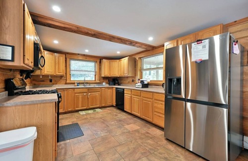 Iron River Cabin | Whispering Waters Lodge with Waterfall, Pond and Trails on Property in Delta, WI