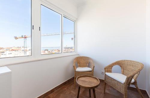 Alfama Apartment | White & Blue Vintage Home in Graça