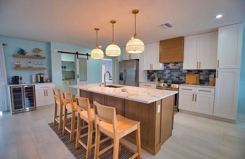 Punta Gorda House | Wide canal where you can watch the many passing boats and sea life.nHeated pool.
