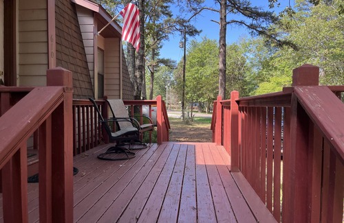 Greers Ferry House | Wooded Bliss on 1 acre with lake access across the street and sleeps up to 10!