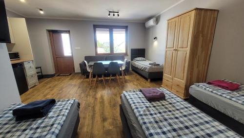 Checiny Apartment | Wrzosowe Wzgórze 5 - Apartamenty