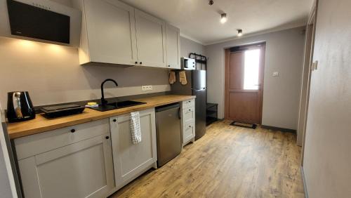 Checiny Apartment | Wrzosowe Wzgórze 5 - Apartamenty