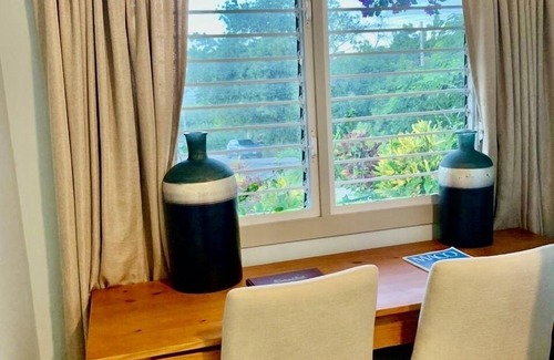 Dickenson Bay Bed & Breakfast | Yellow Maison - Romantic scenic villa 5 Mins from beach!