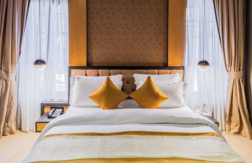 Wuse 2 Hotel | Yellow trumpet wuse