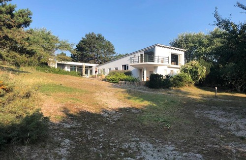 Westenschouwen Villa | Zeemeermin - Retro Beach House nestled in the dunes
