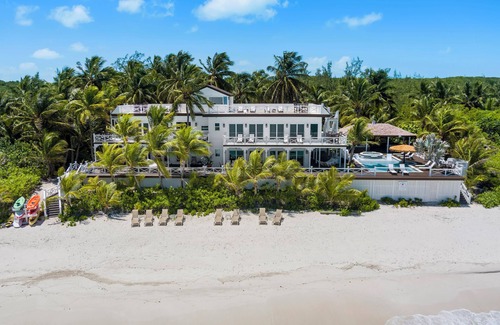 Tar Bay Villa | Zen Exuma: Stunning Beachfront Villa w/NEW Rooftop Lounge, Spa, Cabana & Pool!