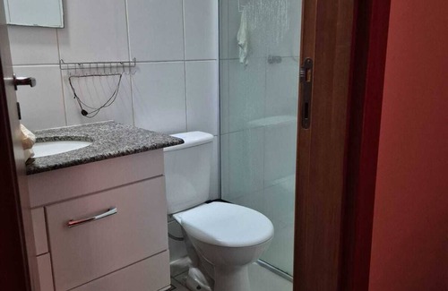 Buritis Apartment | Zen suit room, hot shower, balcony with a view and garage