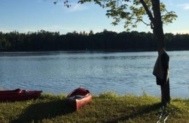 3 bedroom log cabin the lake plus a guest house. 30 mintues from Traverse City