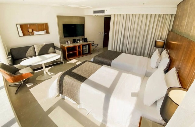 Apart-hotel luxuoso frente ao mar c lazer completo