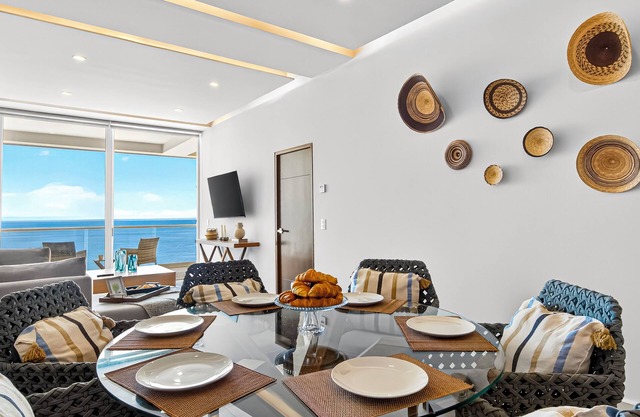 Beachfront 2BR - Pools & Balcony Views