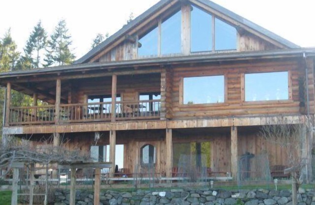 Beautiful log home overlooking the magnifcent Puget Sound.
