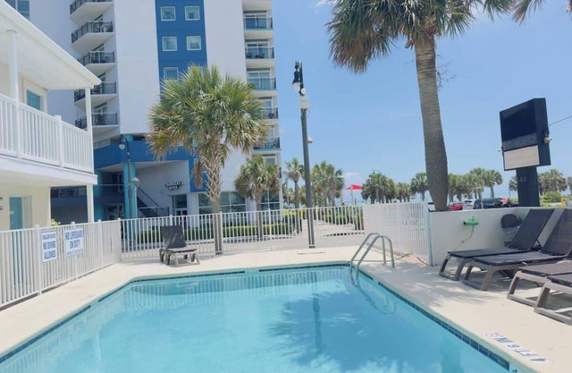 Boutique on the beach, Studio #108 + Pool