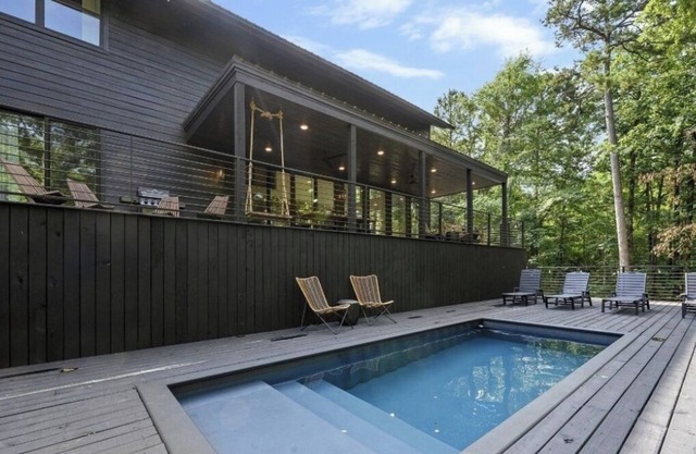 Brand New! Spacious Bougie Wooded Retreat with Heated Pool. Sleeps 22