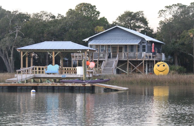 By Boat Only. The Smiley Face House