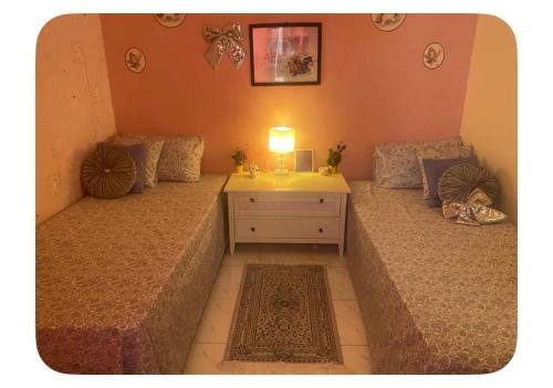 Chambre lits face to face, serviettes, café ou thé offert