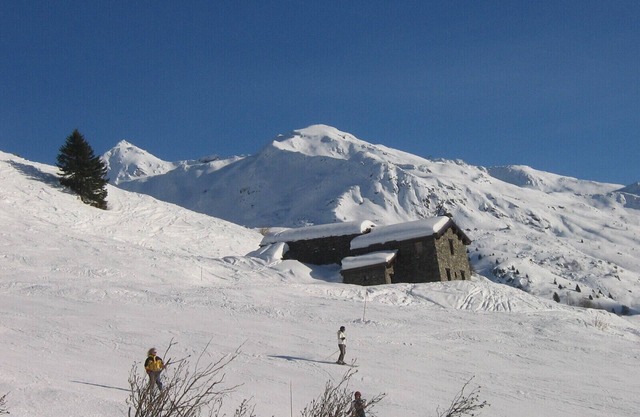 Charming chalet on a ski slope at 5550 feet altitude overlooking the valley;
