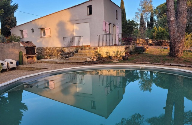 Charming house with swimmingpool and large private garden.