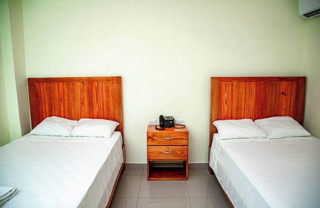 Chic hotel in Punta Cana (room with 2 double beds).