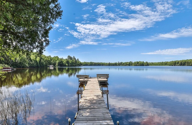 Classic, 5-suite, lakefront resort on South Turtle Lake with dock & firepit