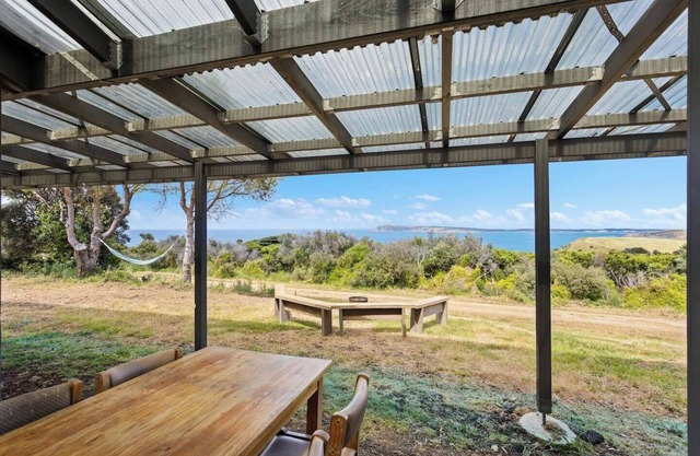 Clifftop Cocoon Swing into Scenic Sea Views