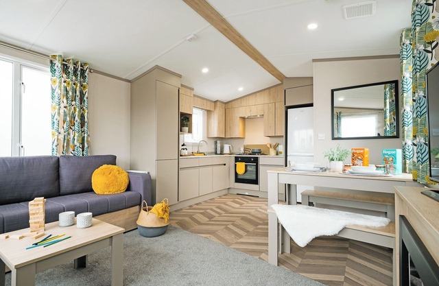 Comfortable, modern two-bedroom caravan sleeping four people.