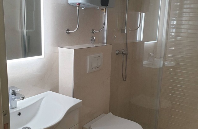 Comfortable studio apartment with patio, two minutes walk from the nearest beach
