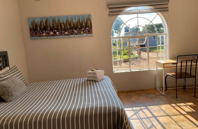 Cosy Cottage Retreat with Garden, Hot Water & Solar Backup in Borrowdale Harare