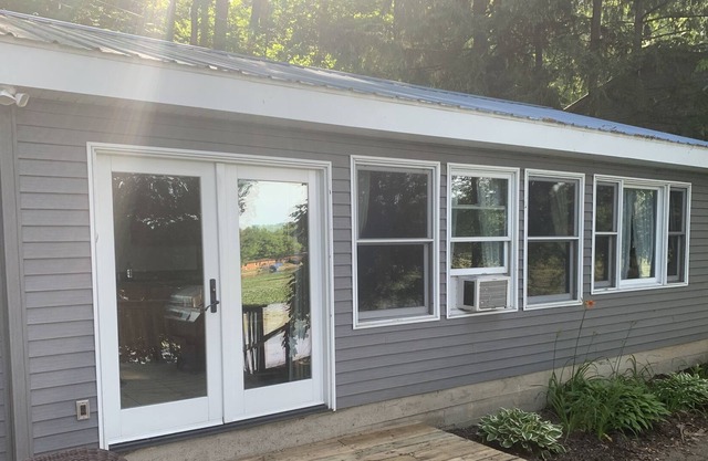 Cozy cottage on the water, fishermans dream.