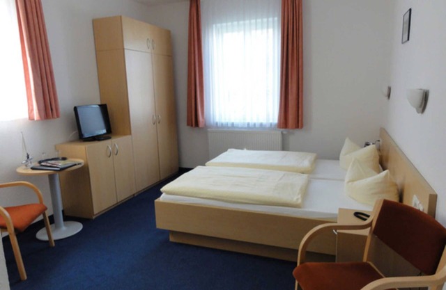 DZ 12. Standard mit Stadtblick - Hotel Garni Meeresgruß