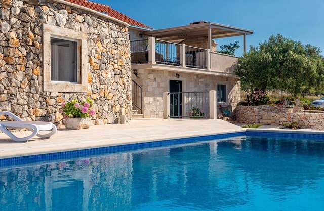 Enjoy the peacefulness of the nature of island Brač overlooking the sea .