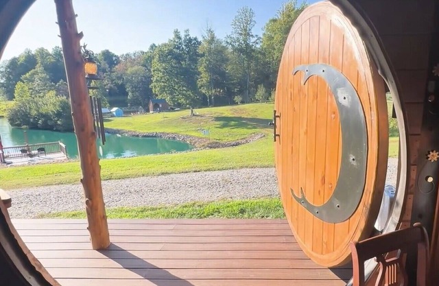 Escape to a Hobbit cottage overlooking a pond with water wheel in wine country!