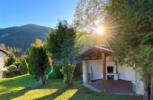 Ferienhaus 38-e mit Terrasse mit Kamin und Bergblick - Ferienhäuser im Feriendorf Weissensee im