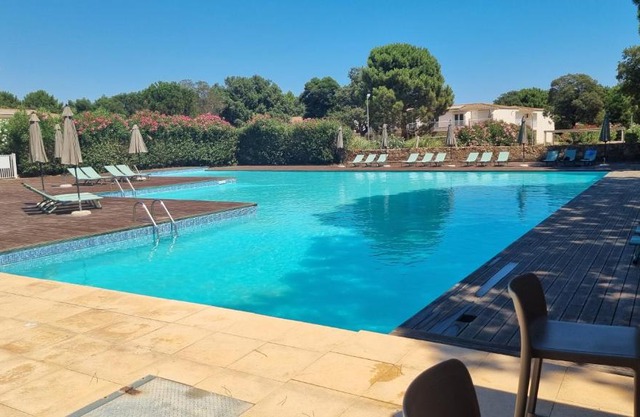 Fiori Di Cala Rossa Très beau studio, 2 adultes 1 enfant moins de 3 ans, au sein d'une résidence hôtelière avec piscine et plage Cala Rossa à 600m
