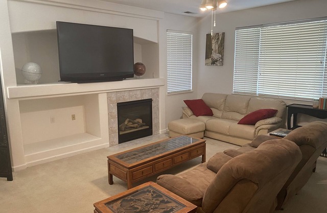 Fully-furnished home with private back yard in quiet, safe suburban neighborhood