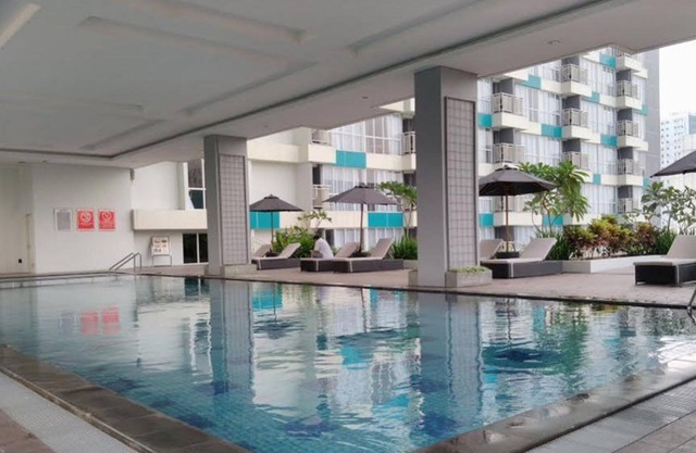 Homey and Good Studio at H Residence Apartment