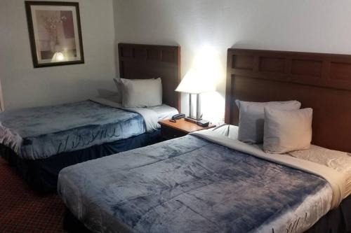 Hotel 2 Queen Beds Hotel Room 222 Wi-Fi Booking