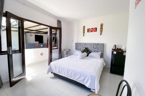 Kana Guest House Mitra RedDoorz