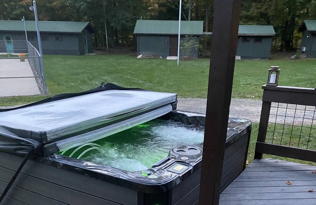 Main cabin w hot tub within a new campground! Hiking biking and fishing!