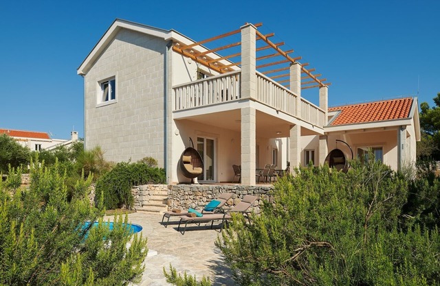 Modern four-bedroom Villa Nella with private pool and beautiful sea view